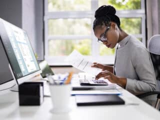 Accountant Examining Financial Documents